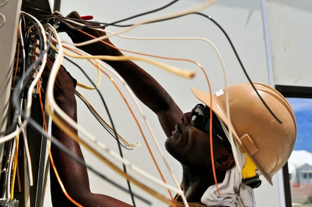 Electrician working on a panel